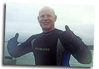 Bill dons his wetsuit before jumping into the Solent